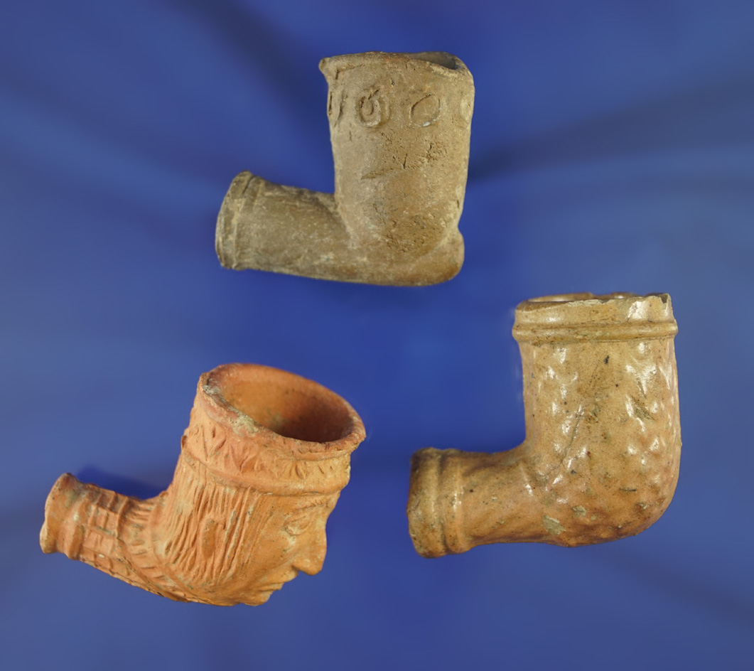 Set of three clay trade pipes, two in very nice condition, one was overheated in the kiln.