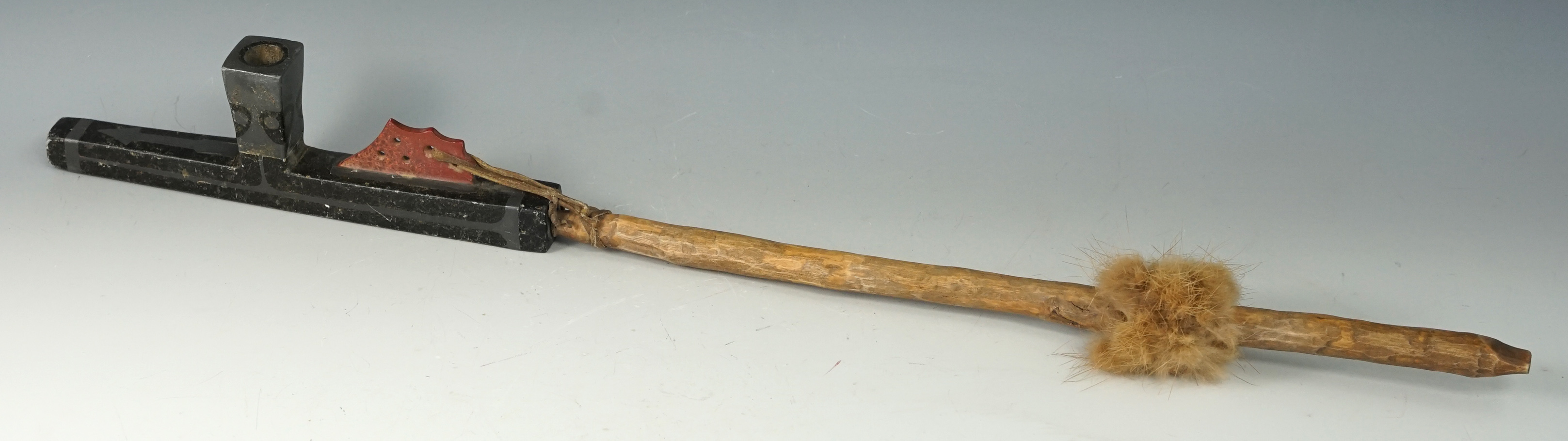 7 3/4" Lead Inlaid Pipe that is broken and glued with the original wood stem and hafting attachment.