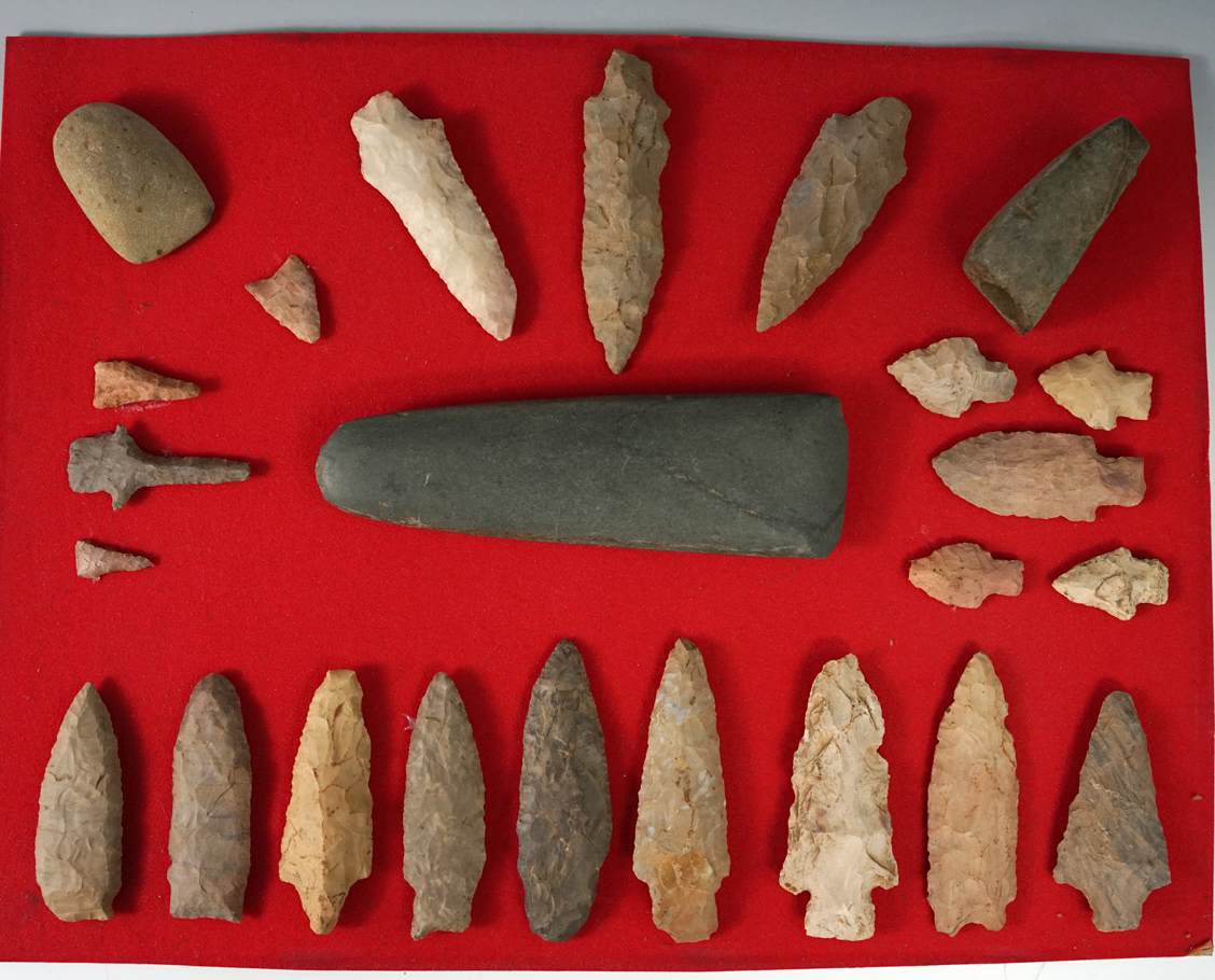 Framed group of artifacts glued to a board found in West Tennessee and the Duck River area.