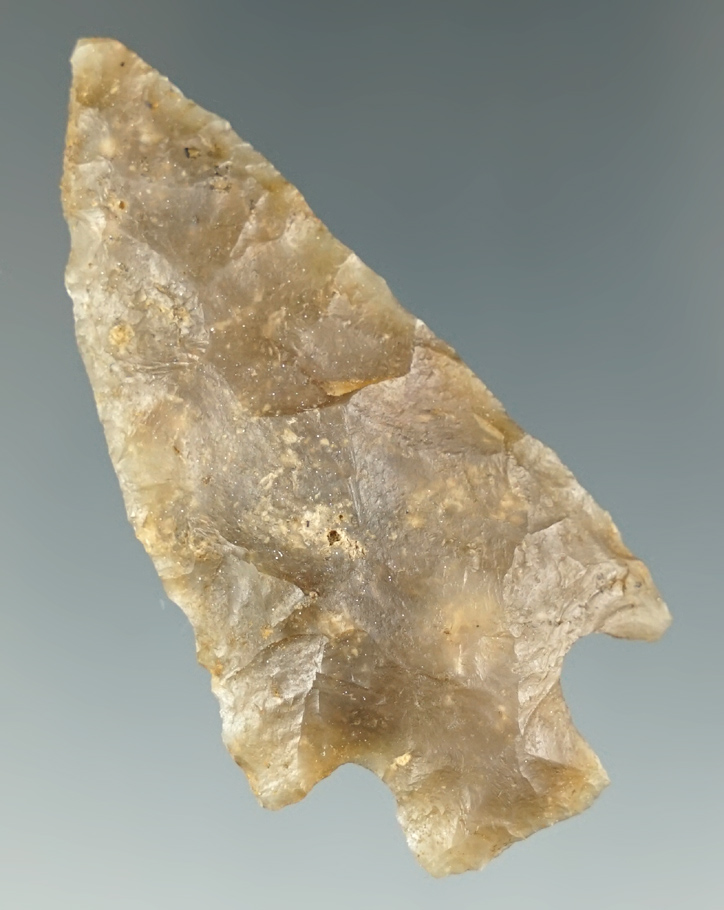 Nice flaking and style on this 2 3/8" point made from highly translucent material. Found in Florida.