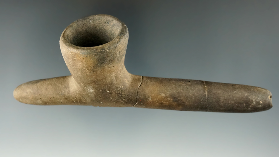 5 3/8" Caddo Pottery Pipe, stem is broken and glued in two places. Found in Mississippi Co., AR