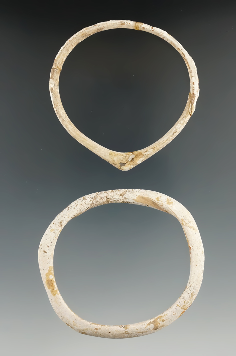 Pair of Hohokam shell Bracelets found in Indiana, one is broken in glued. Both are around 3"