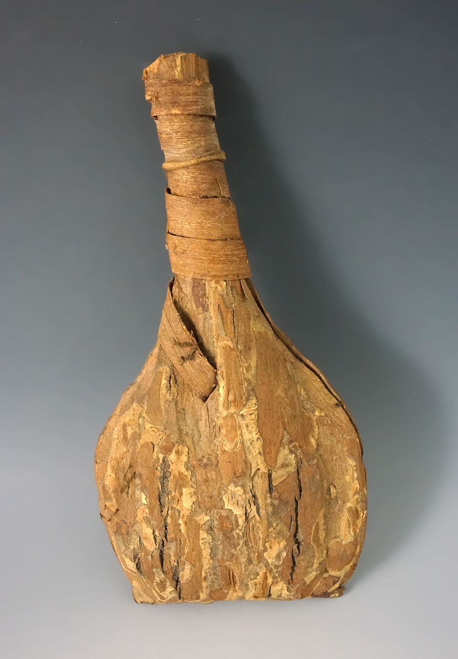 9 1/2" Vintage bark and stone Rattle.