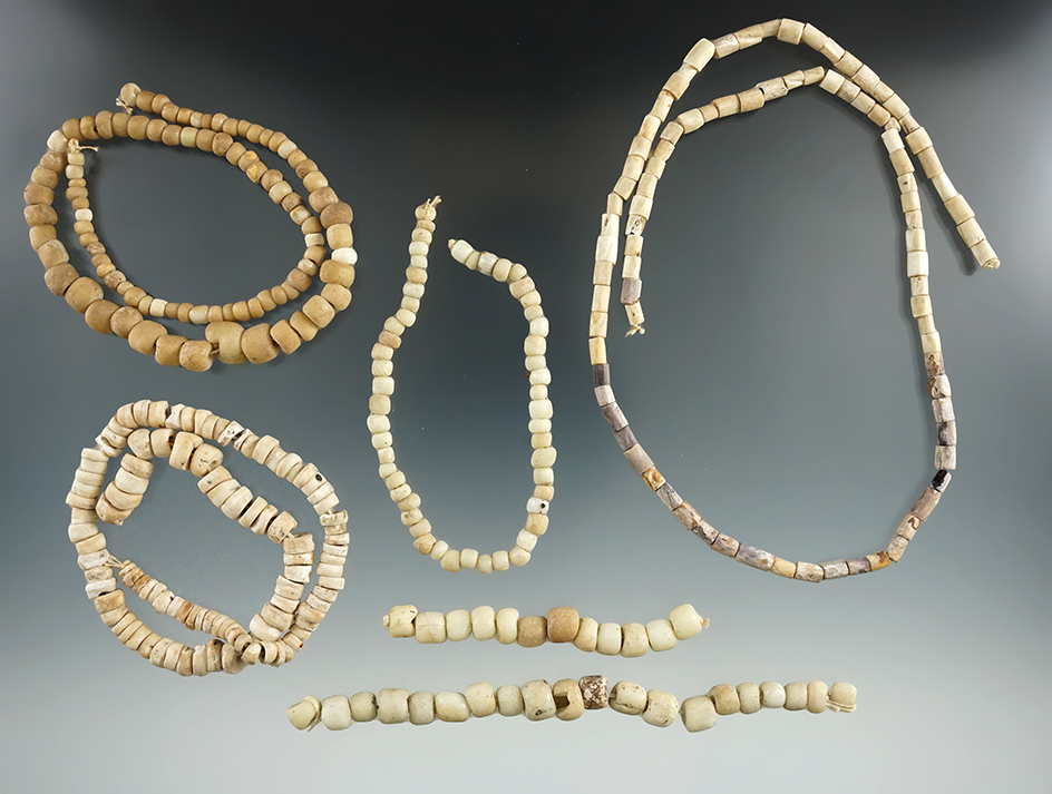 Group of assorted trade and shell beads including an 18" strand of Wampum found in New York.
