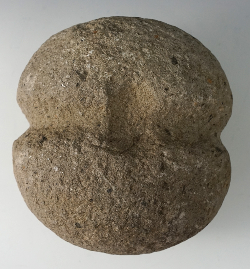 Large and heavy 6" wide full grooved net weight with a knot divot found in South Dakota.