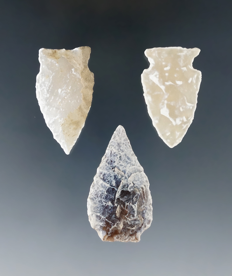 Set of three heavily patinated arrowheads found in North Dakota, largest is 1 5/8".