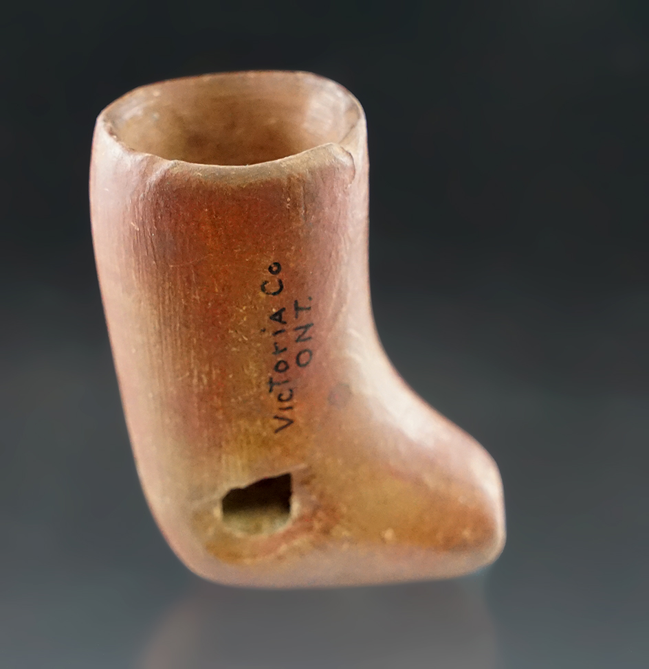 2" Wide Stone Elbow Pipe found in Victoria Co., Ontario Canada. There is one hole to side of elbow.