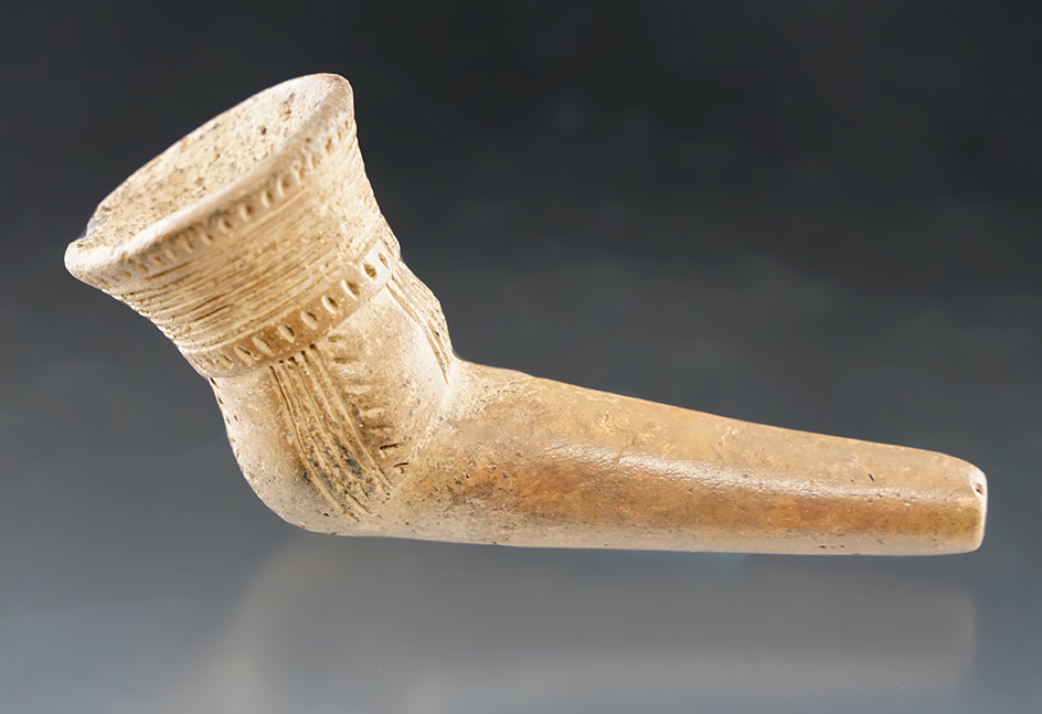Nice! Owasco Bread Basket style Clay Pipe with incredible incised design. Restoration to the stem.