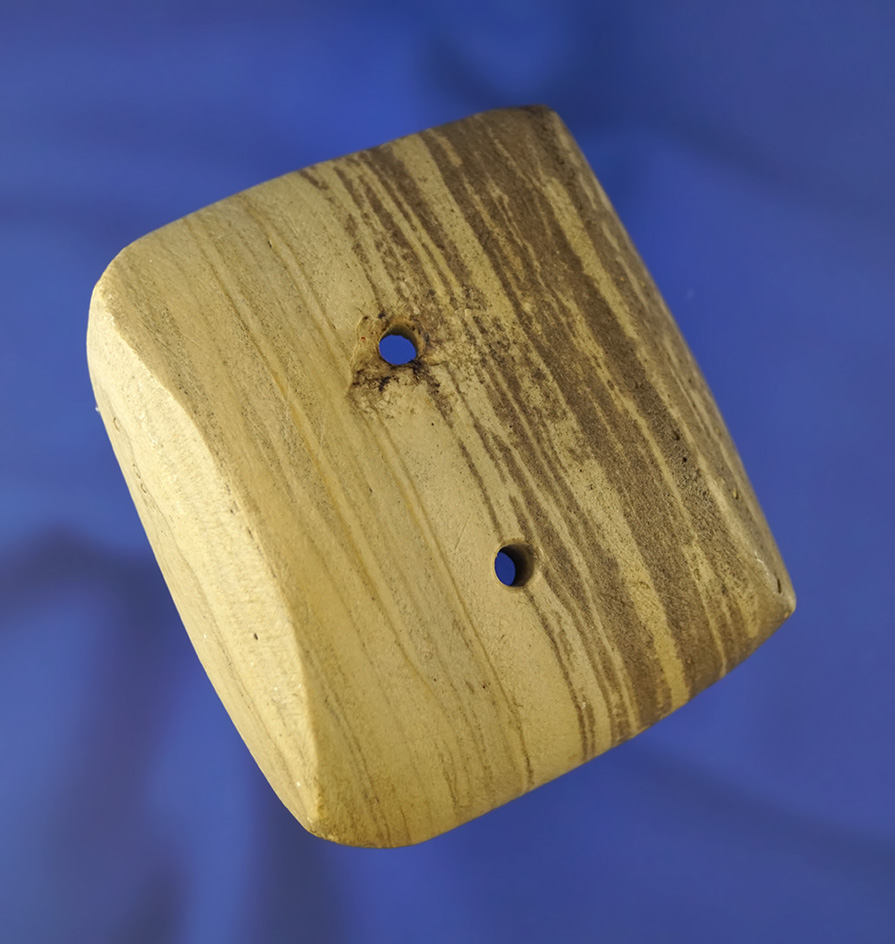 Unique material color! Nicely striped 2 1/2" Semi-Keeled Gorget found in Ohio.