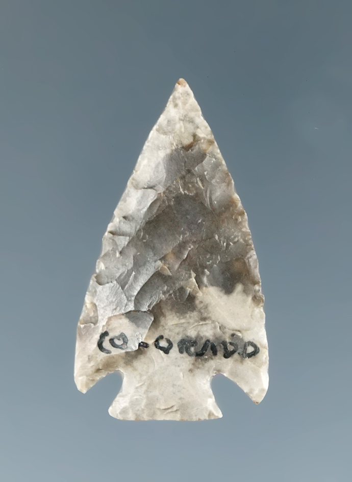 15/16" Nicely flaked cornernotch point found in Colorado.