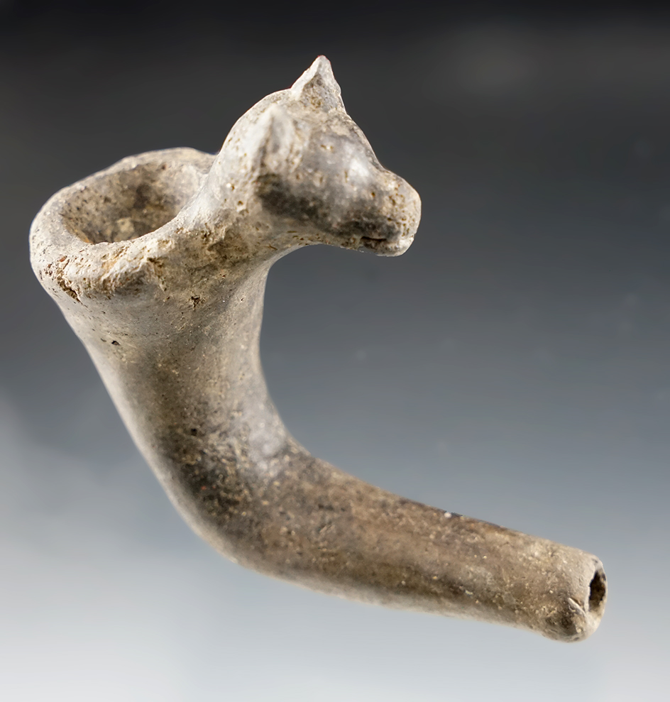 Very nice 2 1/2" long Wolf Effigy Iroquois Clay Pipe with restoration to the stem area. New York.