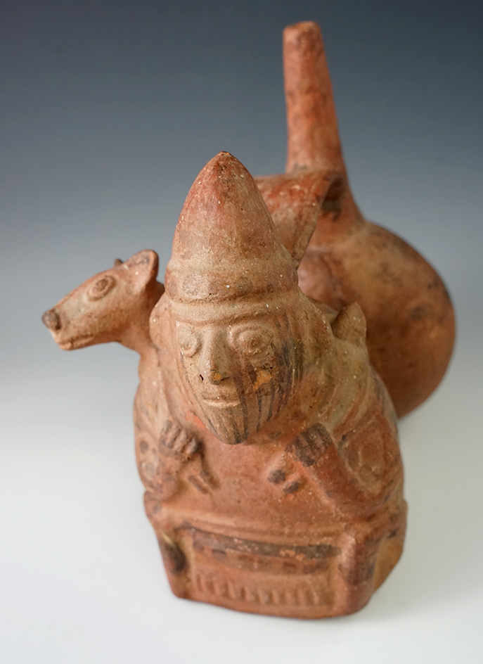 7 1/2" Tall Dual Chamber Stirrup Bottle with some repaired breaks and restoration.