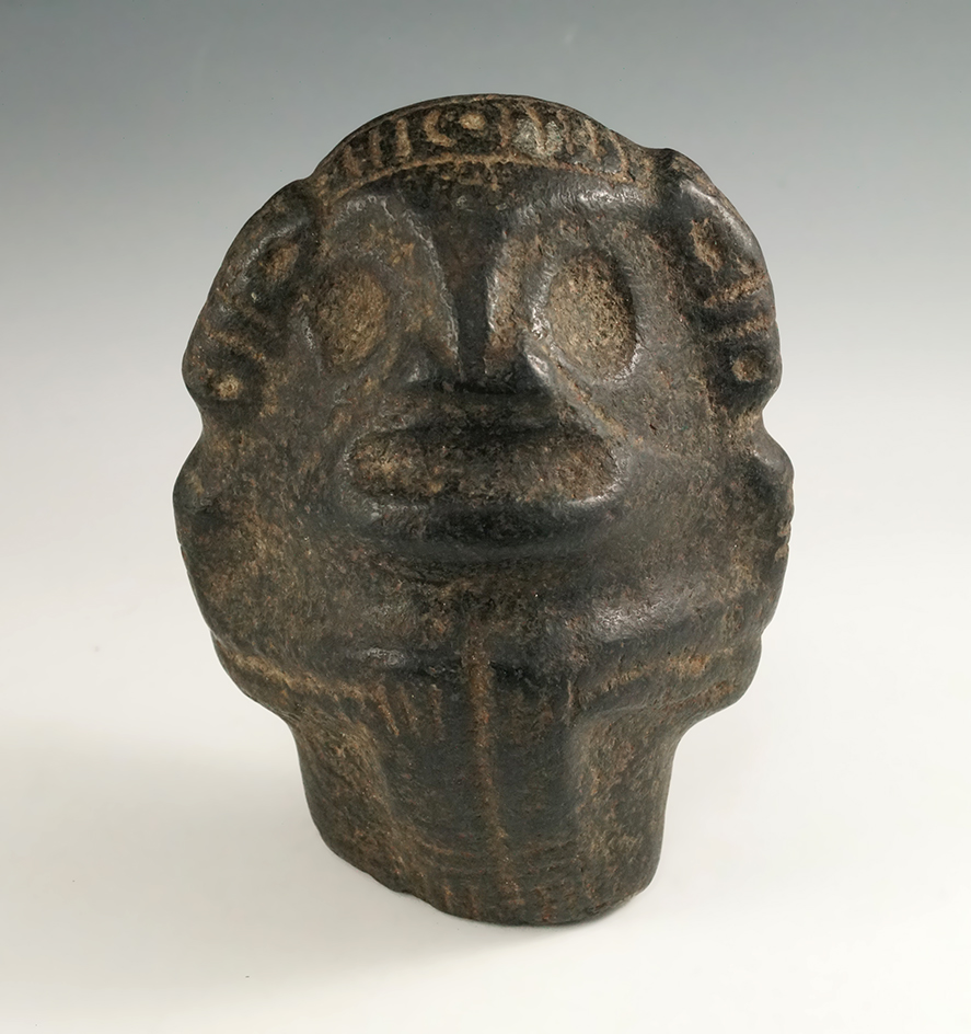 6 3/4" Squatting Zemi found in Hispaniola made from black Hardstone that is very well patinated.