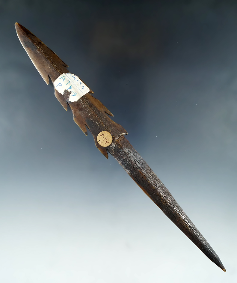 8 5/16" Nicely styled and well-crafted bone harpoon tip which is broken and glued tight - Alaska.