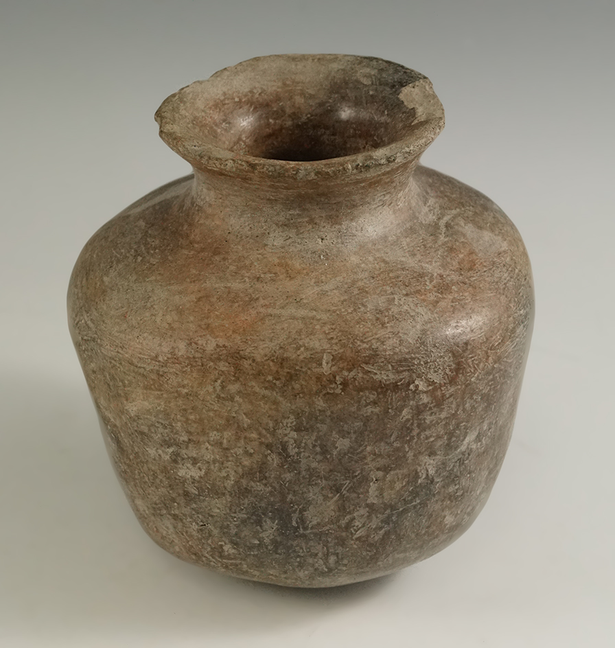 4 1/4" tall Pre-Columbian pottery bottle in nice condition.