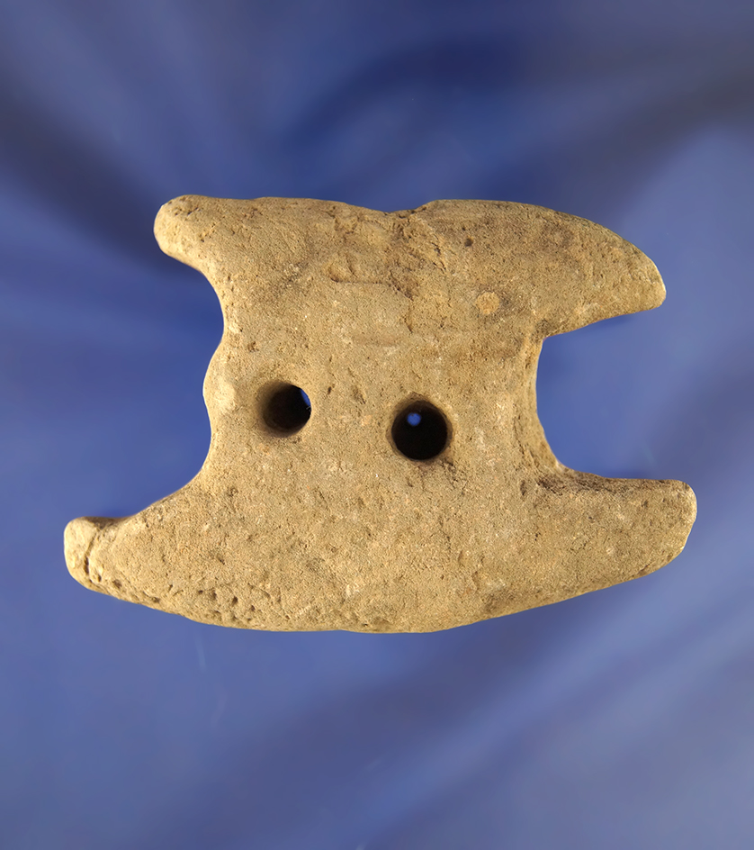 Unique 3 1/8" perforated pottery object found in Tennessee.