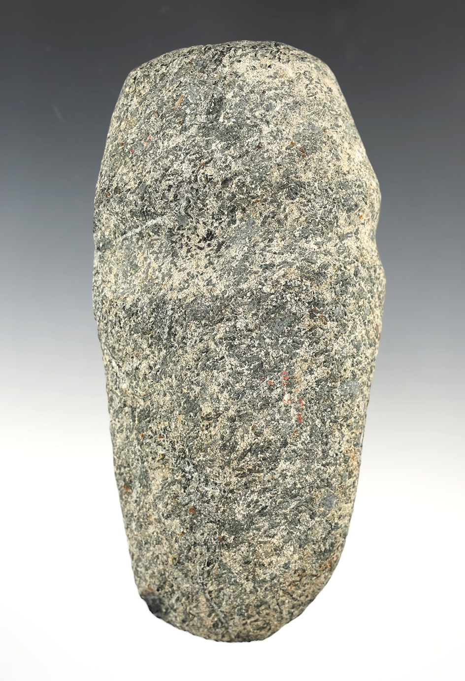 5" long 3/4 Groove axe with heavy ancient use to the bit area. Found in the Midwestern U.S.