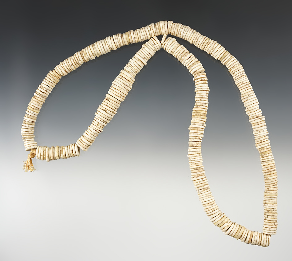 Large 25" long strand of vintage ostrich egg shell beads recovered in South Africa.