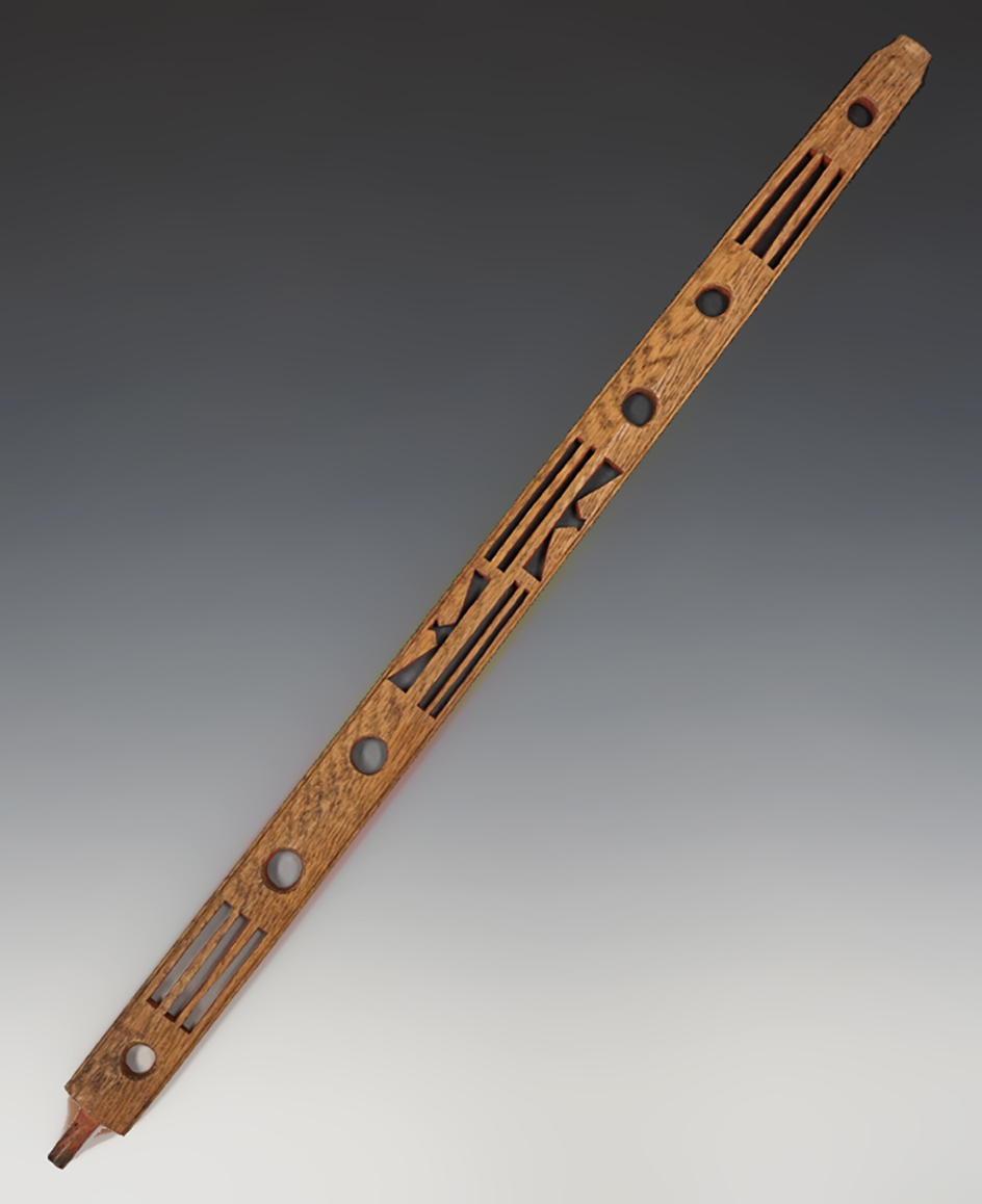 24 1/4" long ornately carved wood pipe stem.