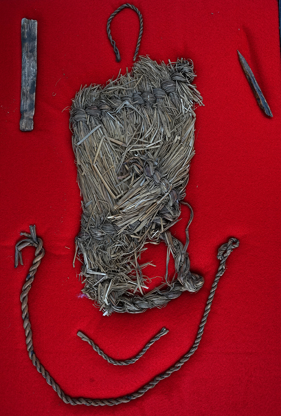 Nice set of perishable artifacts including cordage, bone tools, and a plant fiber sandal.