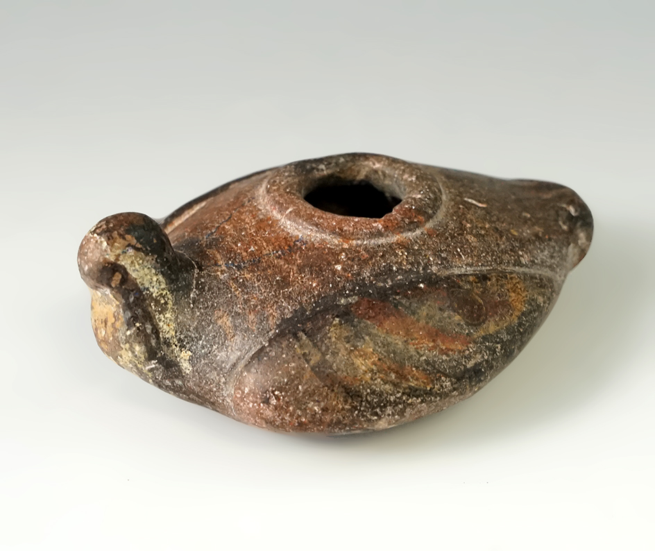 Beautifully crafted 3" long ancient Arabic terra-cotta oil lamp in the shape of a bird.