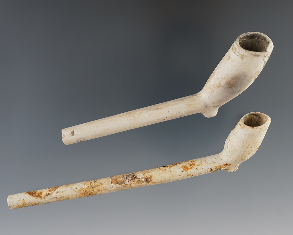 Pair of circa 1650 clay Tavern pipes, largest is 6". The stem on one is broken in glued. Nice displa