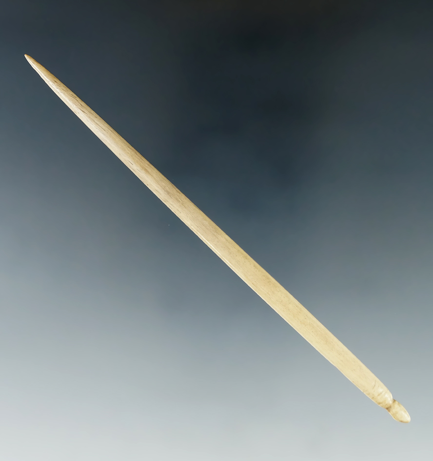 4 and 13/16" nicely polished bone needle found in Tennessee.