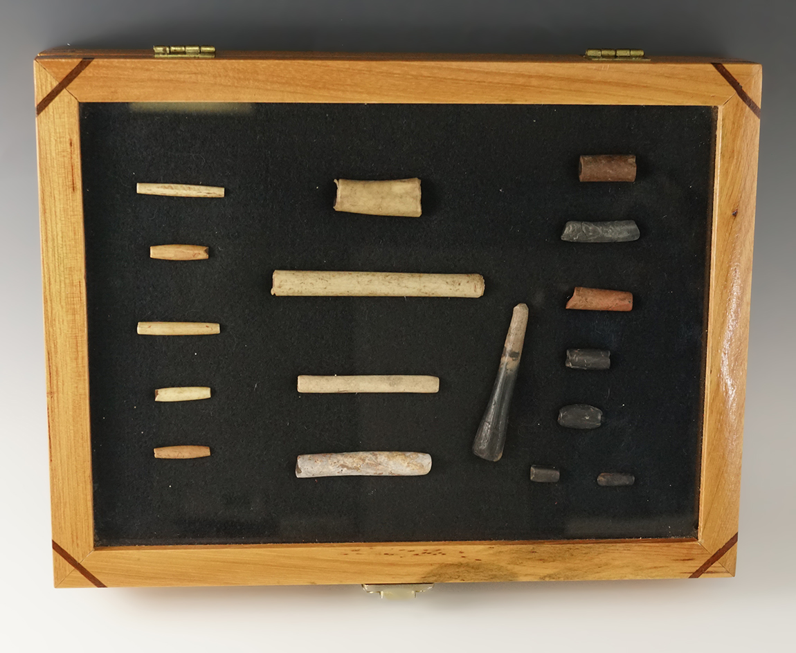 Nice framed group! 17 bone artifacts found a site in Tennessee including beads and a flaking tool