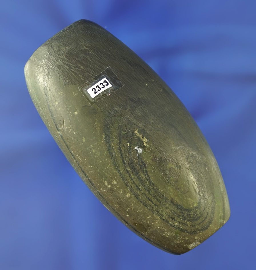 3 1/2" fluted Tubular Bannerstone which is heavily restored.