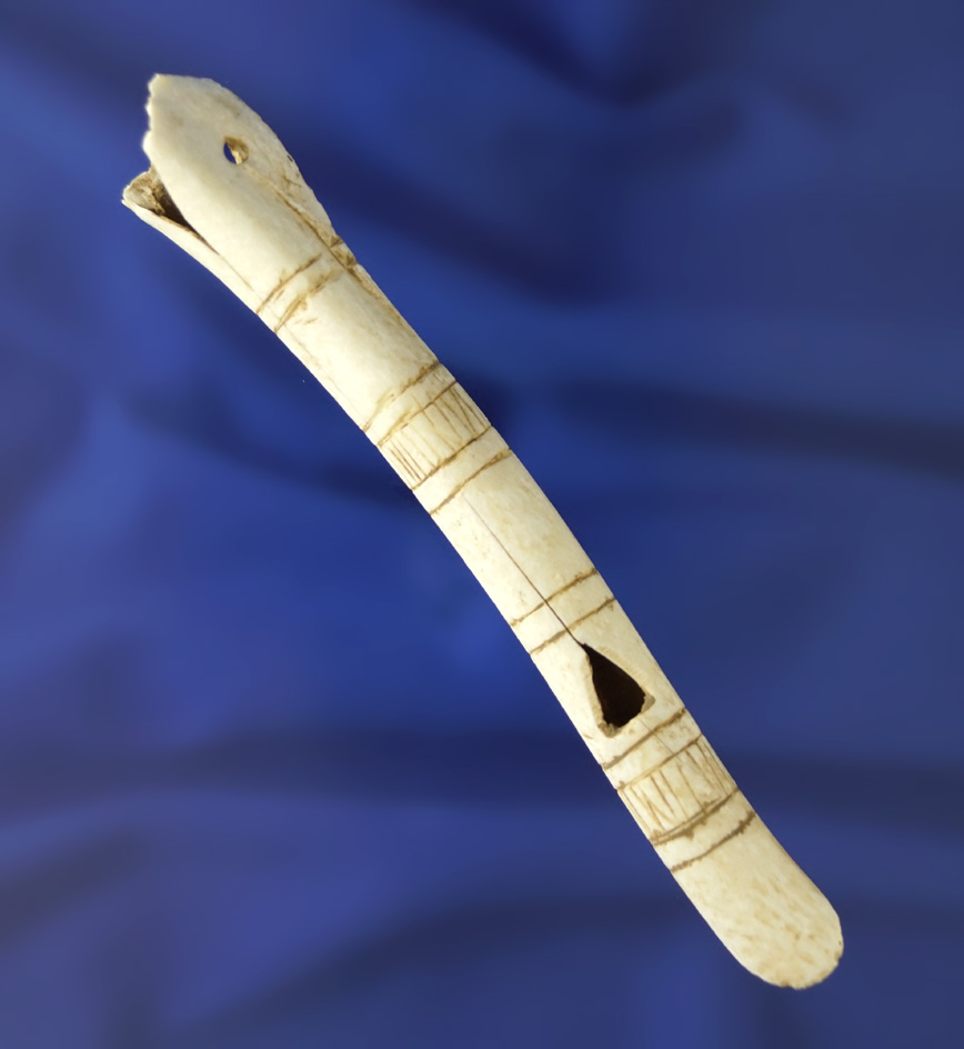 Very unique and nicely carved 4 3/16" long bone whistle - Arikara site north of Pierre, S. Dakota.