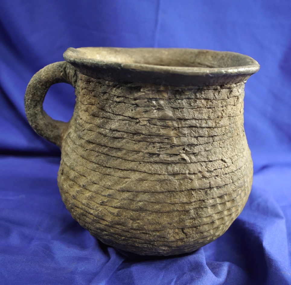 5 3/4" Tall Chord Marked Southwestern Jar with small rim restoration.