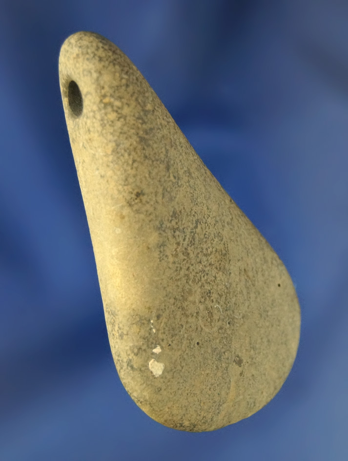 Uniquely drilled 2 3/8" stone Pendant. Finder engraved surface on one side. Found in Ohio.