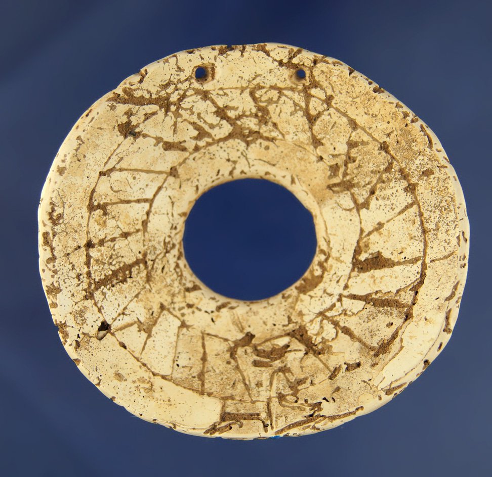 3 1/16" Shell Gorget of unknown origin pictured in Who's Who number nine page 90.