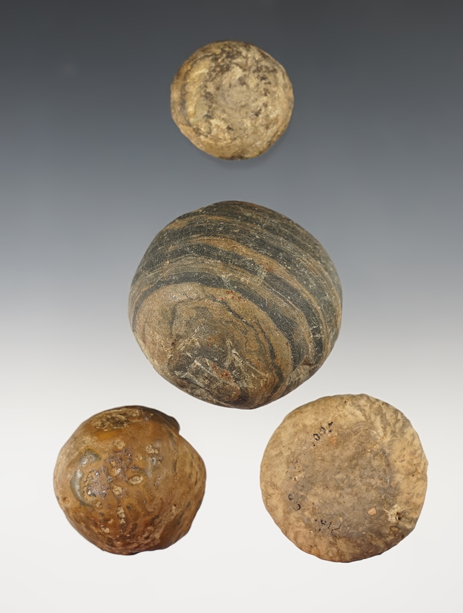 Set of 4 assorted artifacts including 2 Cones and 2 small Discoidals. The largest is 2 1/8" wide.