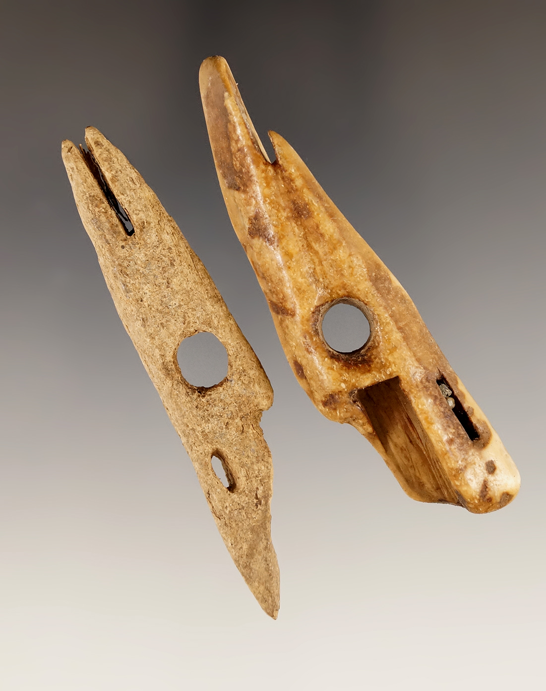 Pair of very old Inuit bone harpoon toggles found in Alaska. Largest is 3".