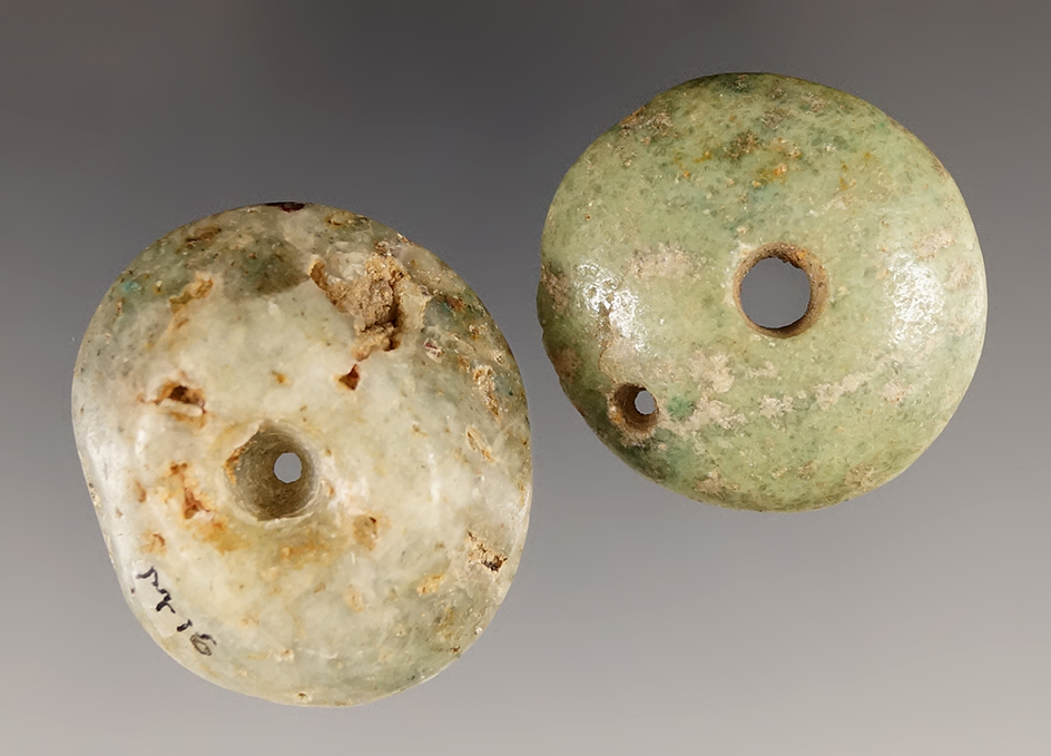Pair of drilled Pre-Columbian Hardstone beads found in Mesoamerica. Largest is 1 3/8".
