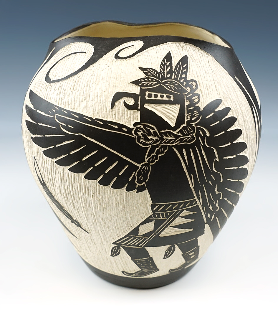 Wonderfully made contemporary 6 1/2" tall pottery vessel signed  A. & V. Lucario of Laguna, NM