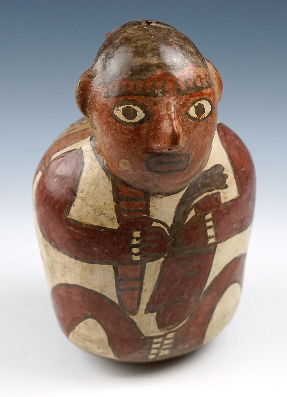 6 3/4" Tall Nazca Culture pottery vessel with damage to the spout. Found in Peru.