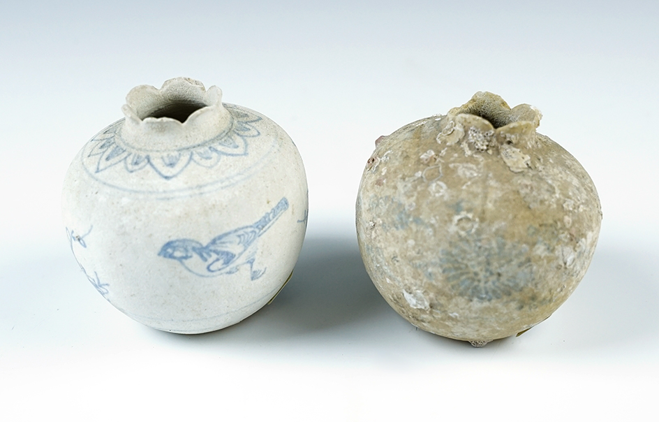 Pair of 2 3/8" tall jars. One still has original ocean barnacle growth on surface. From the Hoi Ann Shipwreck! 