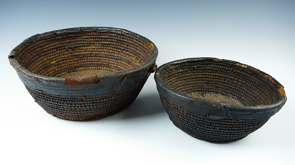 Pair of vintage African baskets. Largest is 10" diameter. 