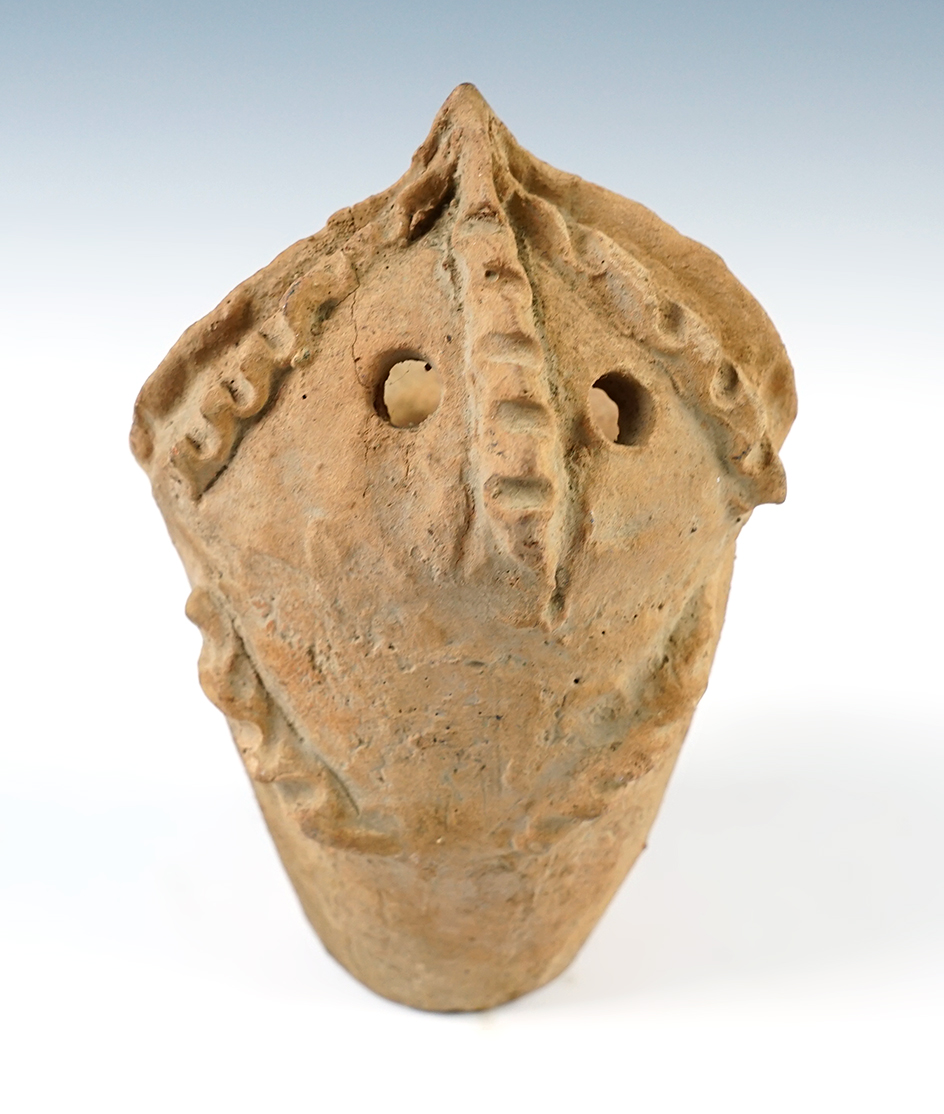 5 1/4" tall Asian pottery vessel with effigy motif.