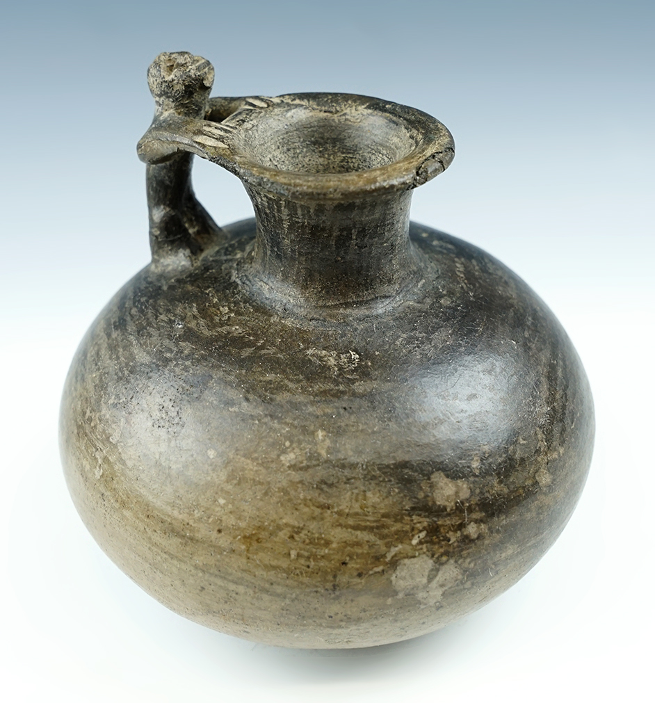 4 1/2" tall late Moche miniature human effigy bottle - Peru. Ex. Steve Puttera, Marvin King.