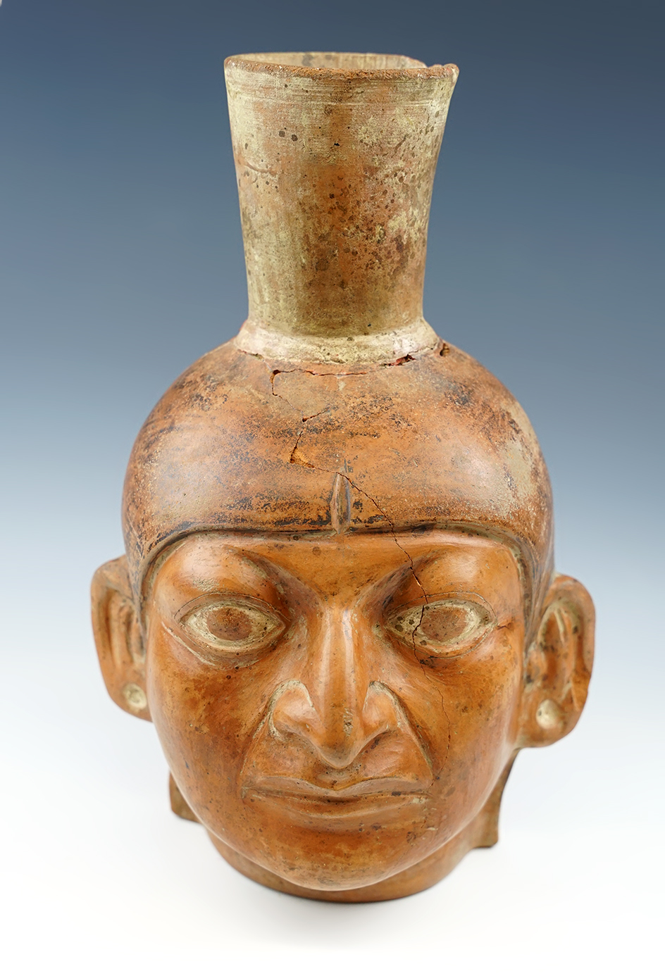 Large size 11 1/4" tall x 7" wide Moche IV head pot broken and reglued around the spout neck.