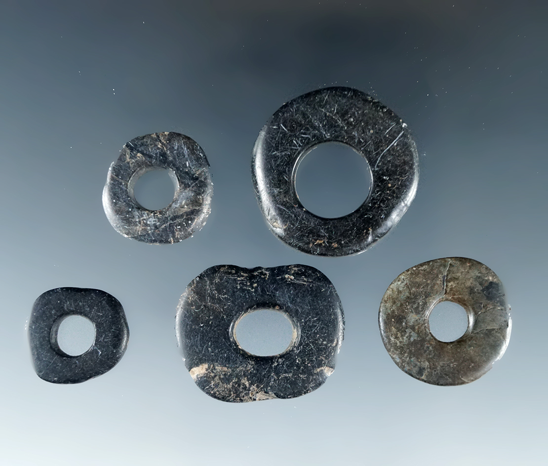 Set of five drilled Stone Rings from the Dalles area on the Columbia River. Largest ring is 7/8".