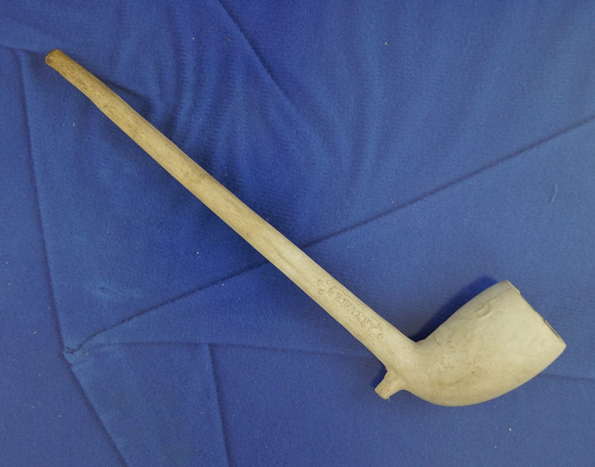 6 3/4" clay tavern pipe made in Germany with the initials RLM written on bowl.