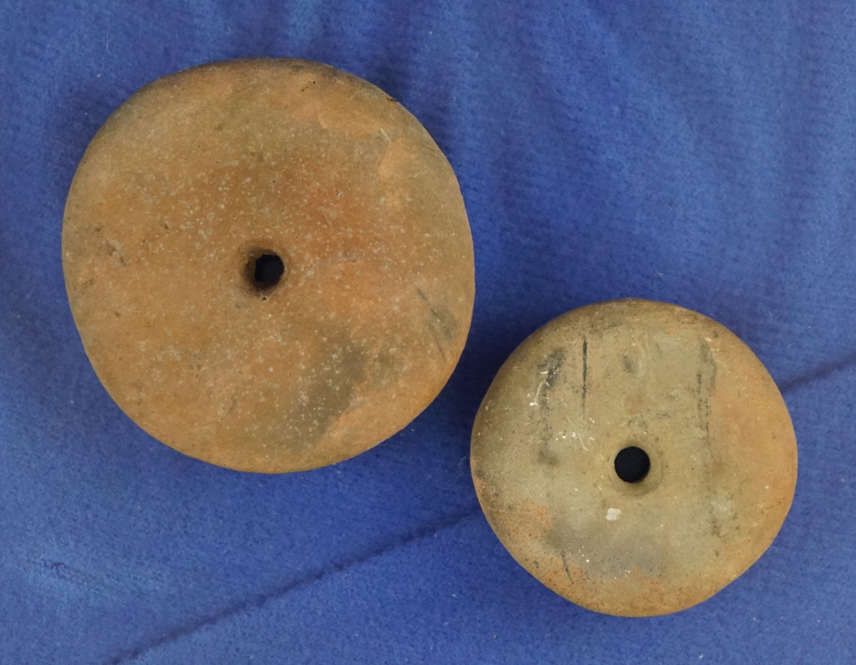 Nice pair of drilled clay Mississippian pottery beads found near a mound in Cross  Co.,  Arkansas.