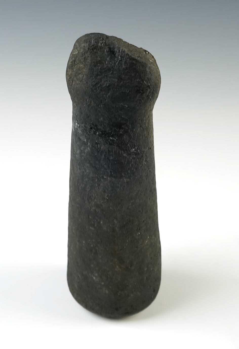 Uniquely styled 5 7/8" Pestle found around the Columbia River area. Broken and glued.