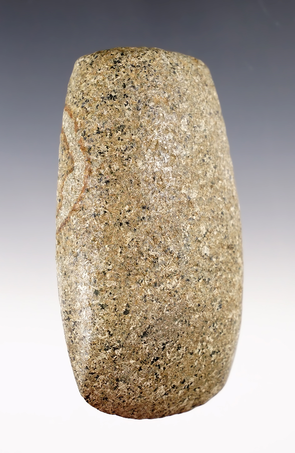 4 1/8" Square Poll Hopewell Celt with a nice "worm track" on one side. Found in Perry Co., Ohio.