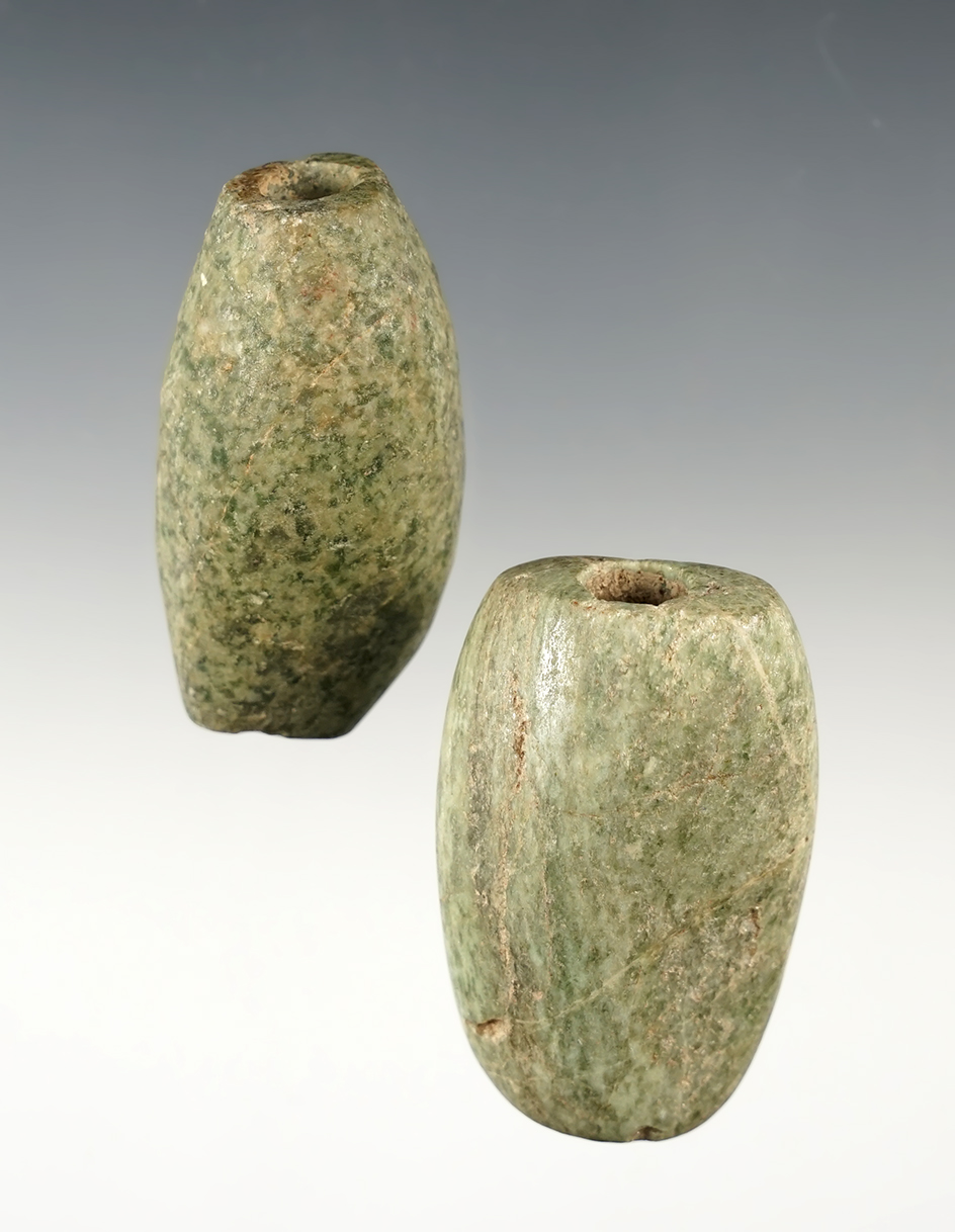 Pair of well patinated Pre-Columbian Beads found in Guatemala. The largest is 2 1/16".