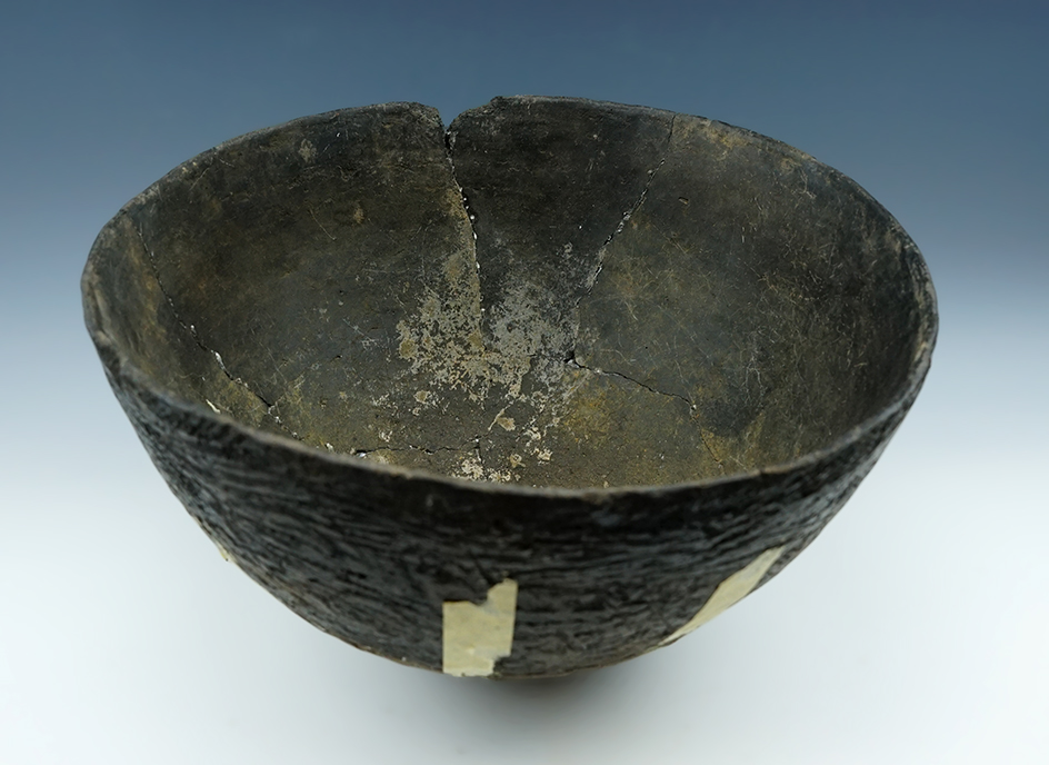 Very large 11" wide x 7" tall pottery vessel recovered in New Mexico. Large pieces glued.